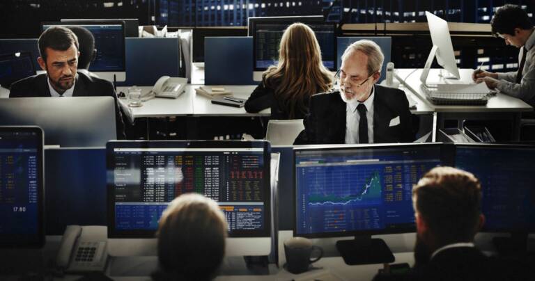 Brokers engaged in trading on the stock market.